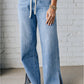  light blue jeans with drawstrings
